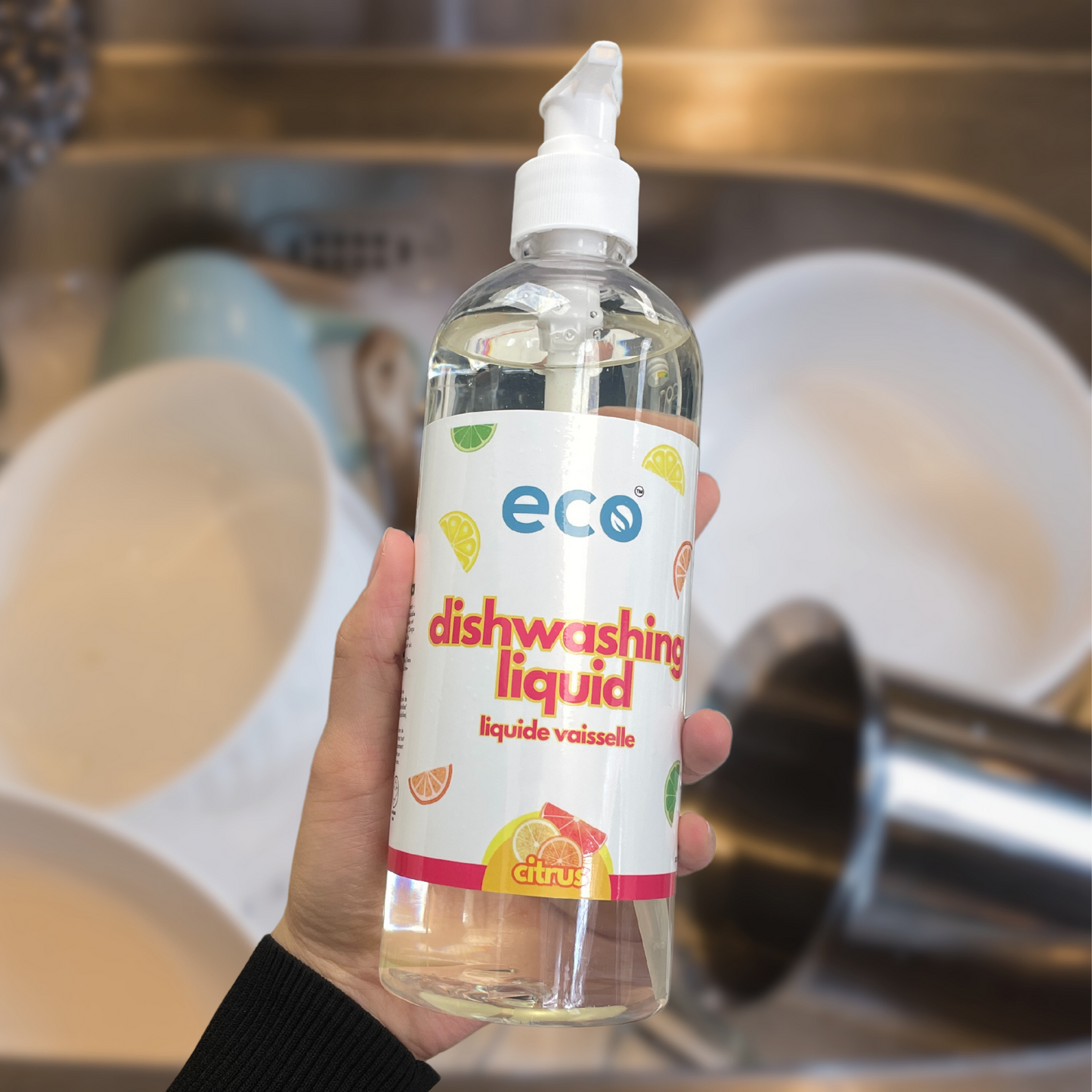 Eco Refillery's dish soap by the sink, for an eco-friendly and plant-based kitchen.
