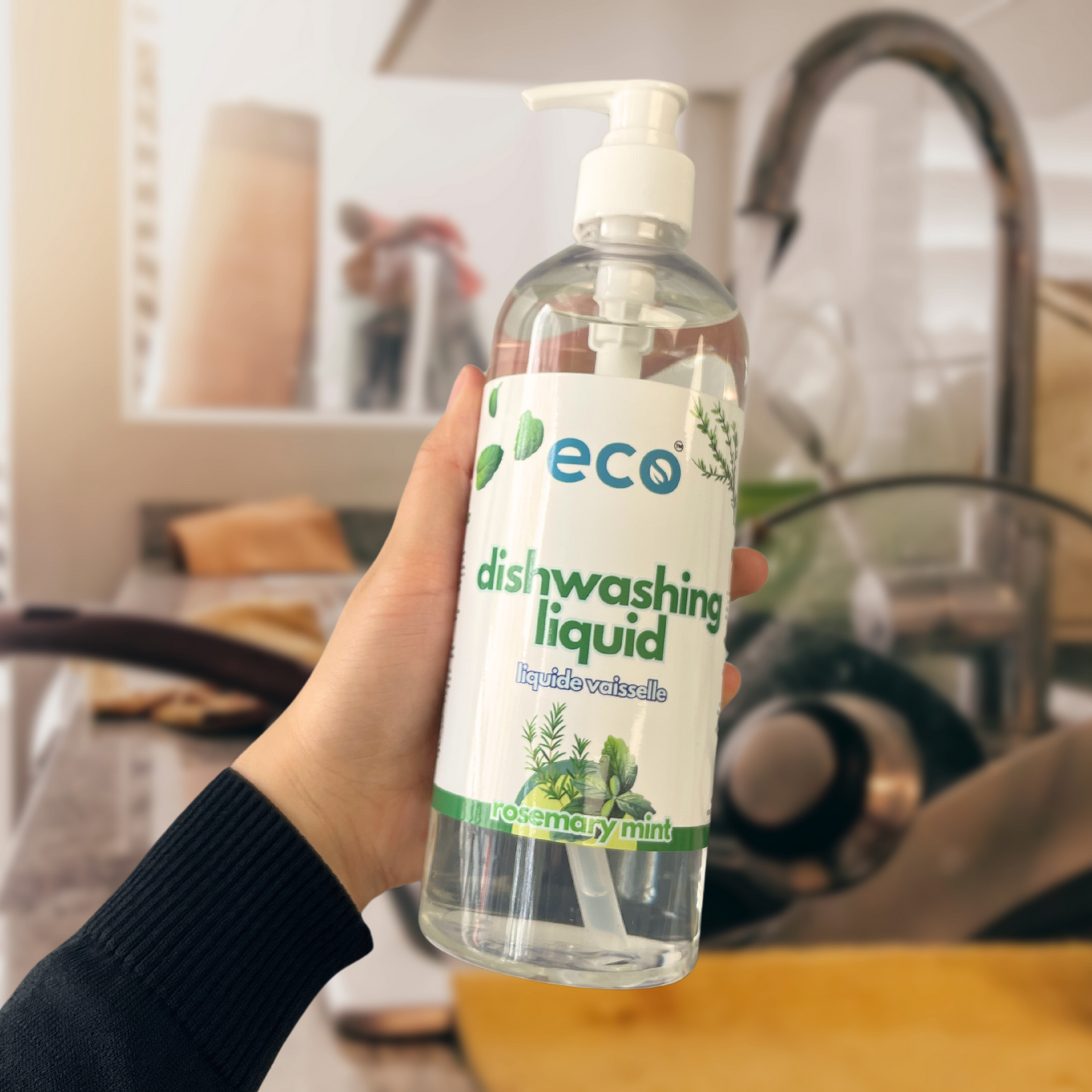 Person using Eco Refillery's dish soap.