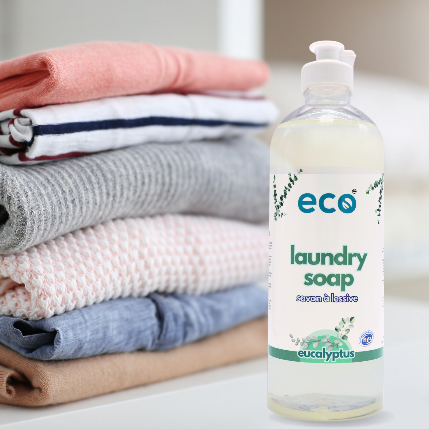 Eco Refillery's laundry soap with a pile of clothes.