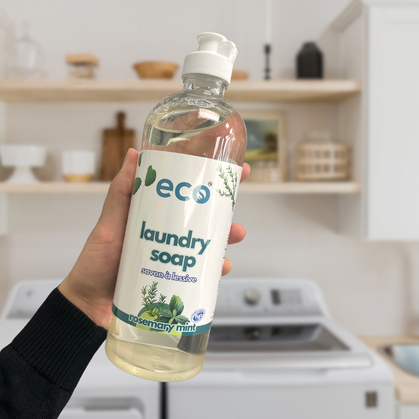 Person using Eco Refillery's laundry soap, for an eco-friendly and plant-based cleaning routine.