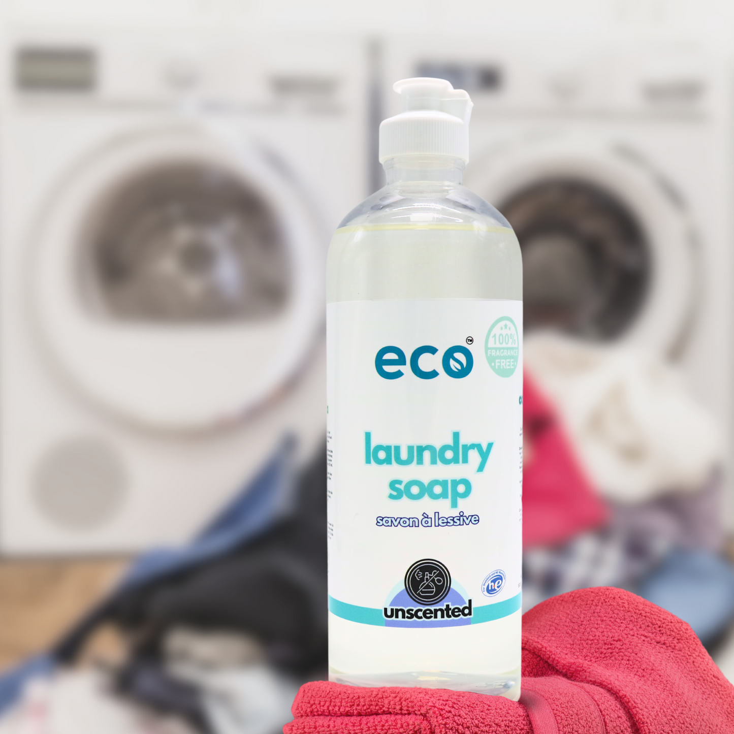 Eco Refillery's laundry soap with a pile of clothes.