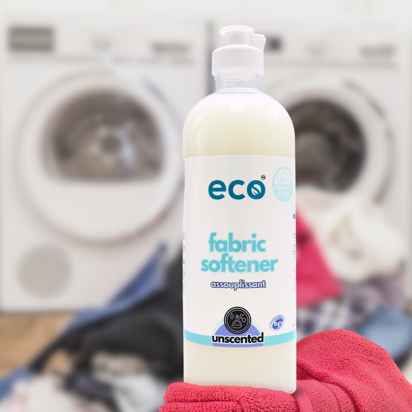 Eco Refillery's fabric softener by a pile of laundry.