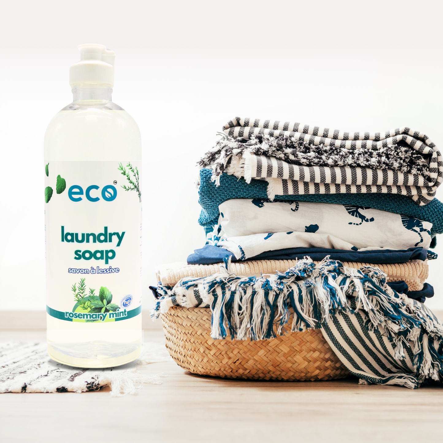 Eco Refillery's laundry soap with a pile of clothes.