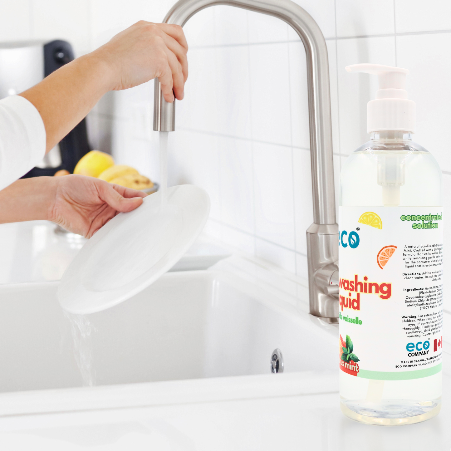 Eco Company's dish soap in the sink, for an eco-friendly kitchen.