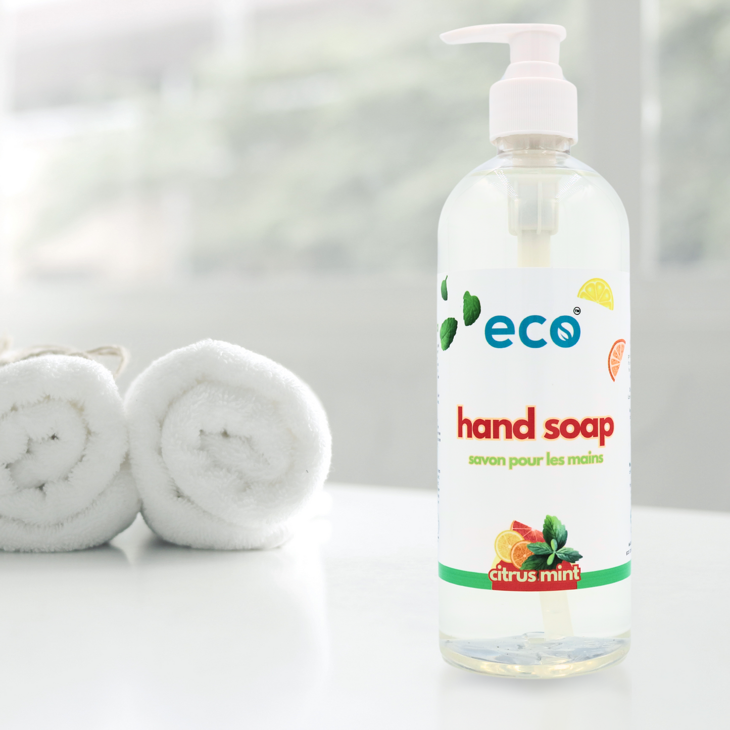 Eco-friendly plant-based hand soap bottle in a washroom.